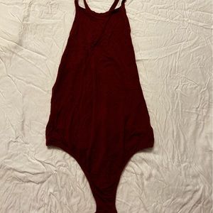 Workhall size medium open back red body suit